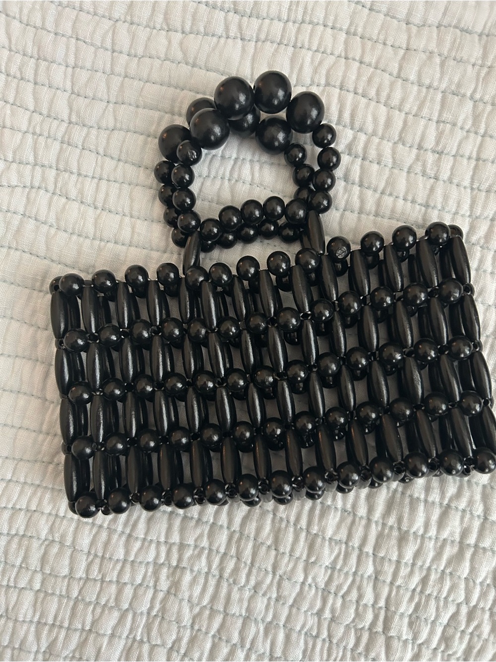 mini black wooden bag